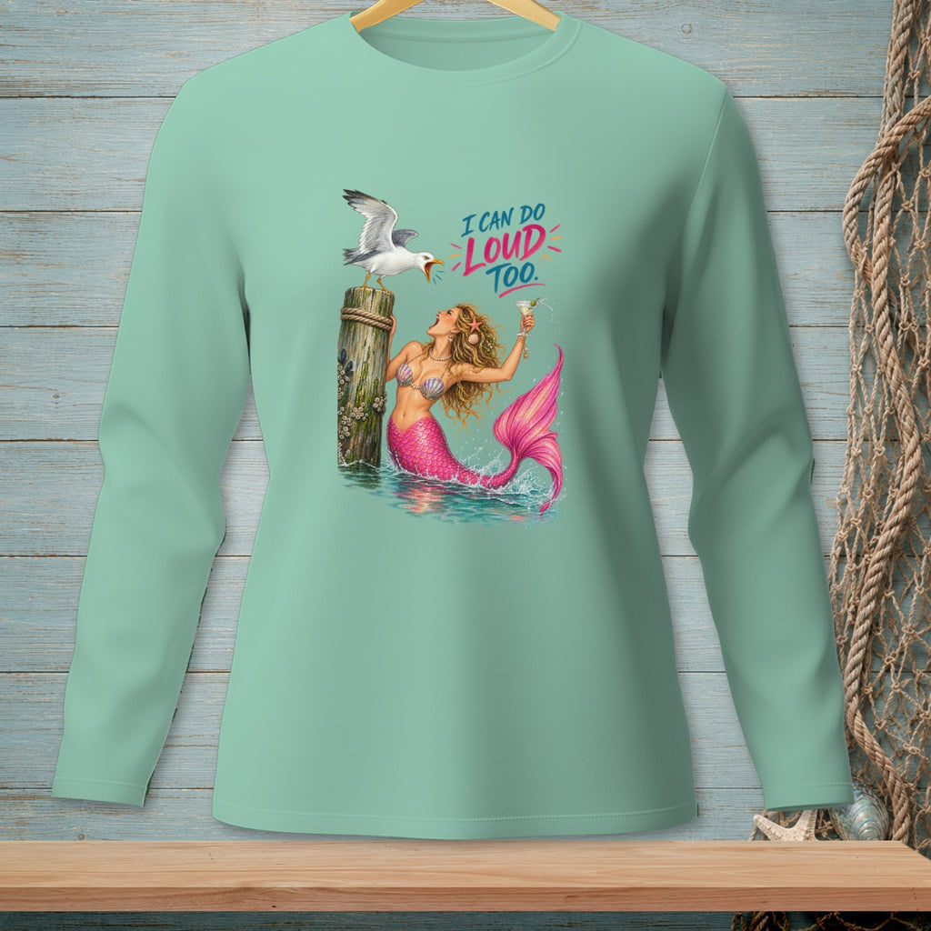 Mint green long sleeve shirt with a mermaid, seagull, and text.