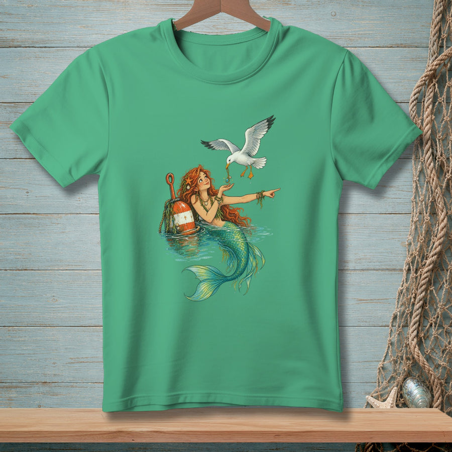 Mermaid with red hair interacts with a seagull near a buoy in the ocean.