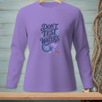 Purple long-sleeve shirt with text and mermaid tail graphic.