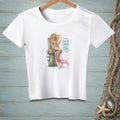 White t-shirt with a mermaid illustration and text reading "Salty hair, don't care."