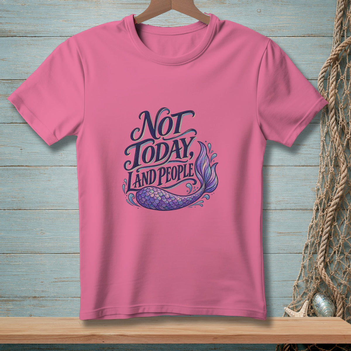 Pink t-shirt with "Not Today Land People" and mermaid tail graphic.