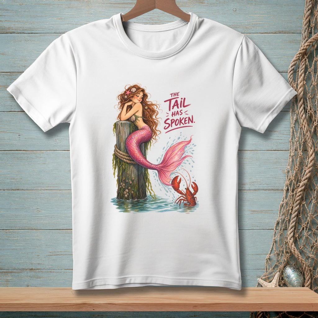 White t-shirt with a mermaid sitting on a post, text reads "The tail has spoken."