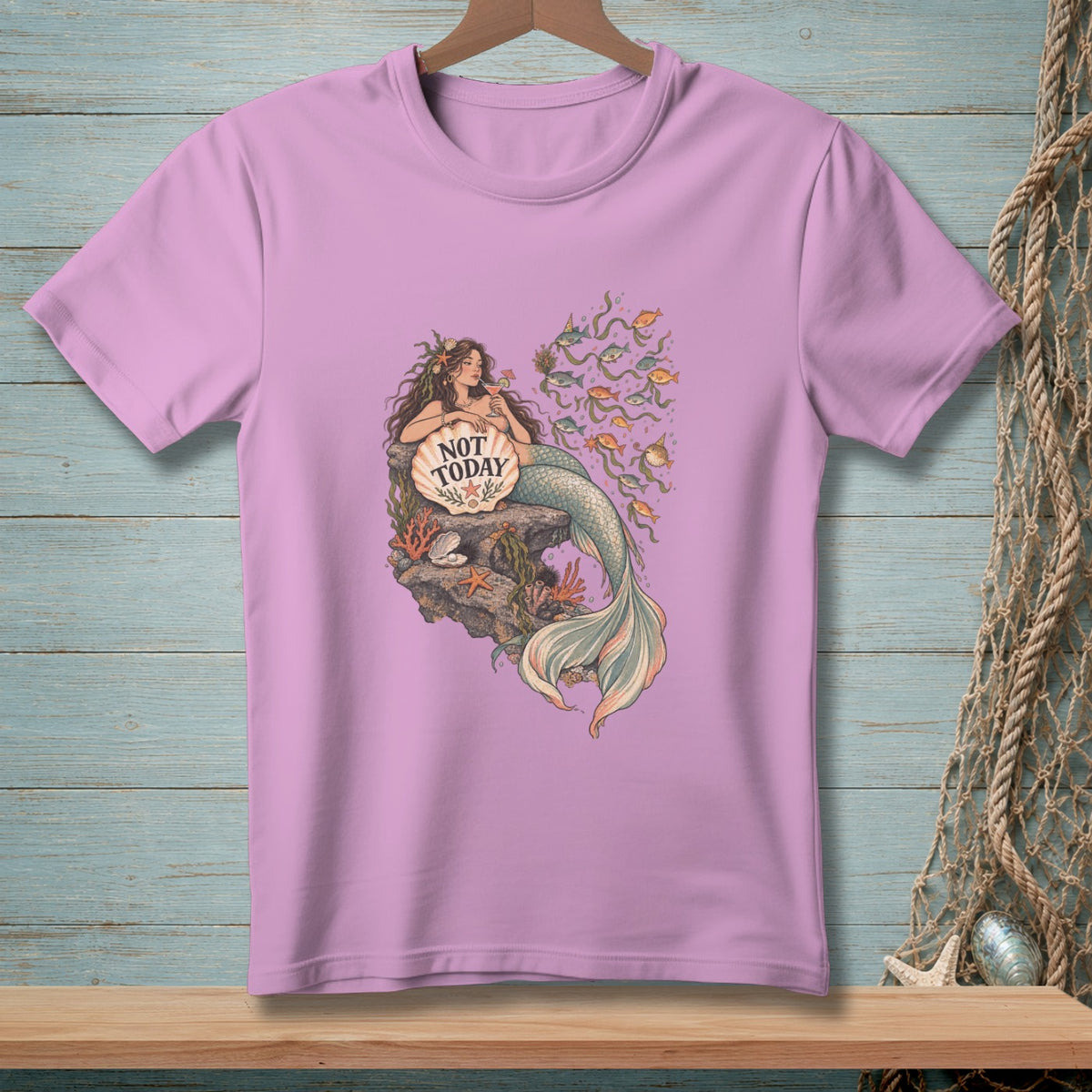 Mermaid on a rock with seashell reading "NOT TODAY" and a school of fish.