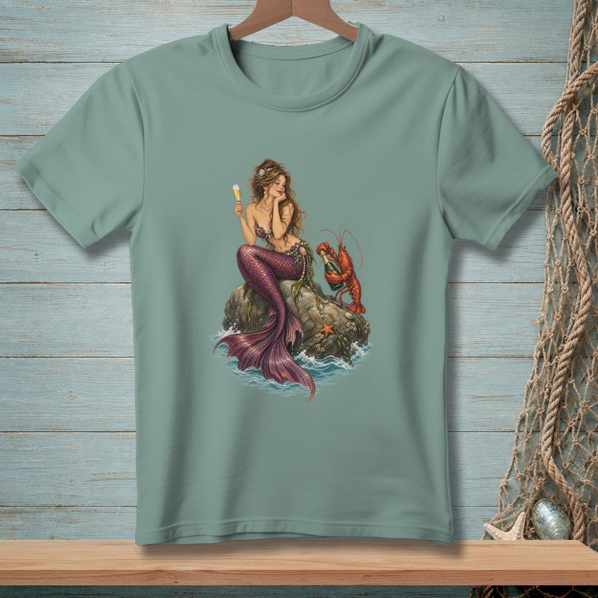 Illustration of a mermaid with a glass of champagne sitting on a rock with a lobster.