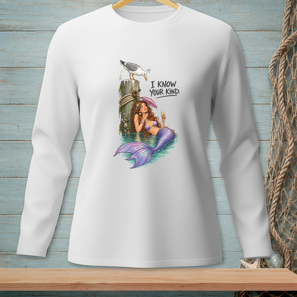 White long-sleeve shirt with a mermaid holding a drink and a seagull on a post.