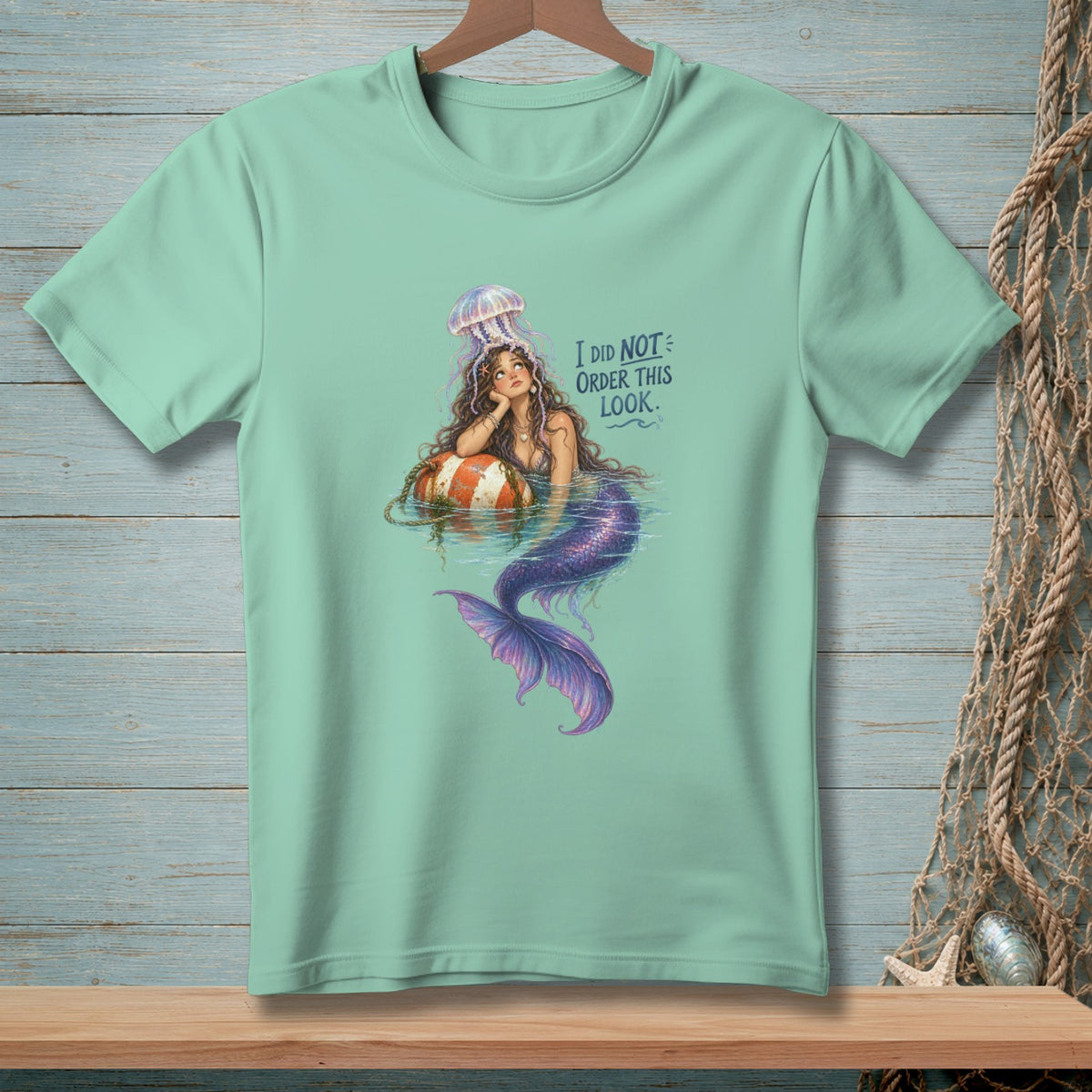 Mint t-shirt with a mermaid wearing a jellyfish hat and text "I DID NOT ORDER THIS LOOK."