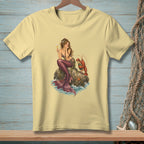 Pale yellow t-shirt featuring a mermaid holding a champagne glass with a lobster.