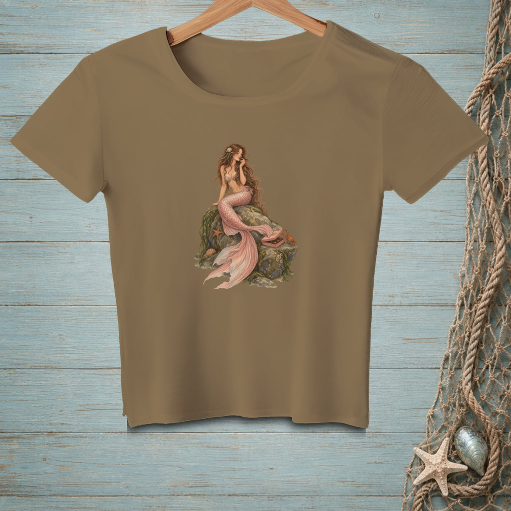 T-shirt with a mermaid sitting on rocks, with a pink tail and seashell bra.