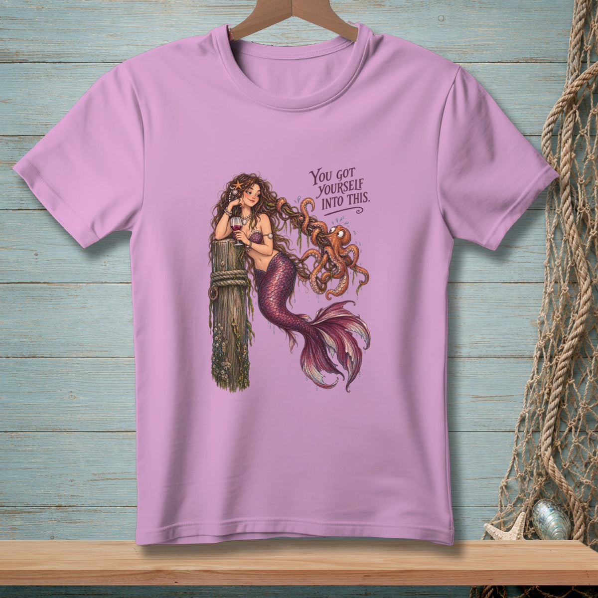 Pink t-shirt with mermaid entangled with an octopus and text "You got yourself into this."