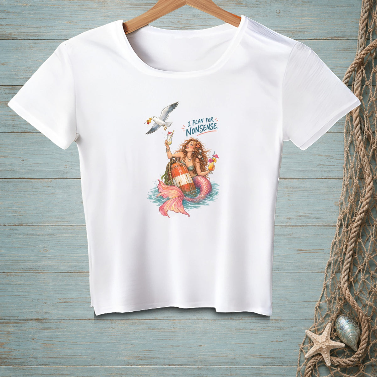 White t-shirt with mermaid, buoy, seagull, and text "I PLAN FOR NONSENSE."