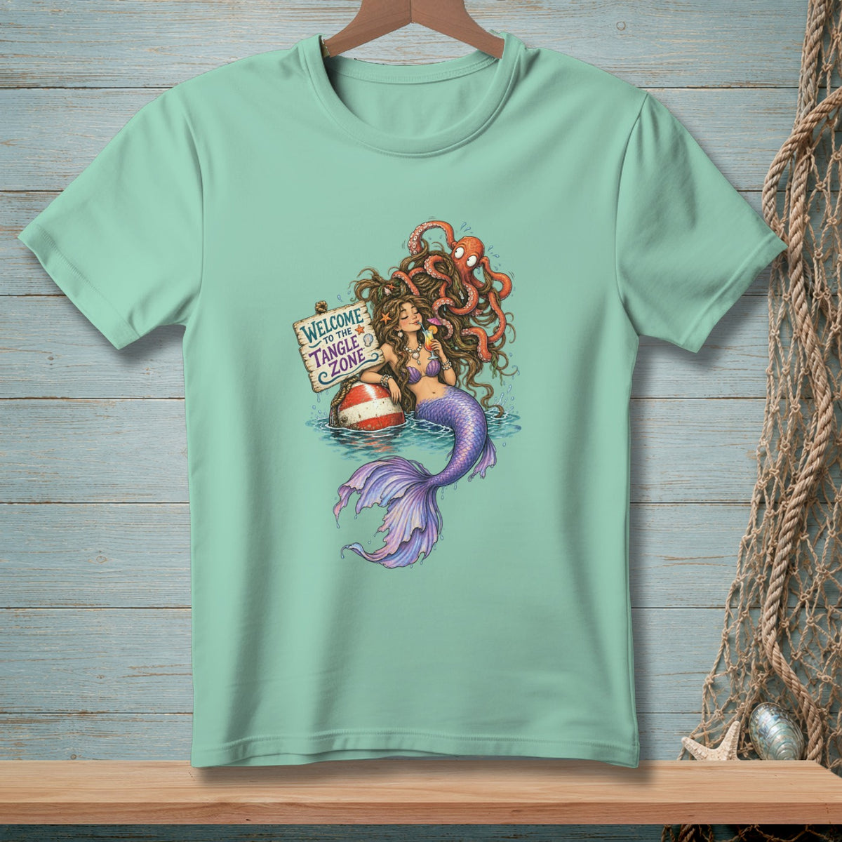 Mermaid with octopus on head holds drink next to "Welcome to the Tangle Zone" sign.