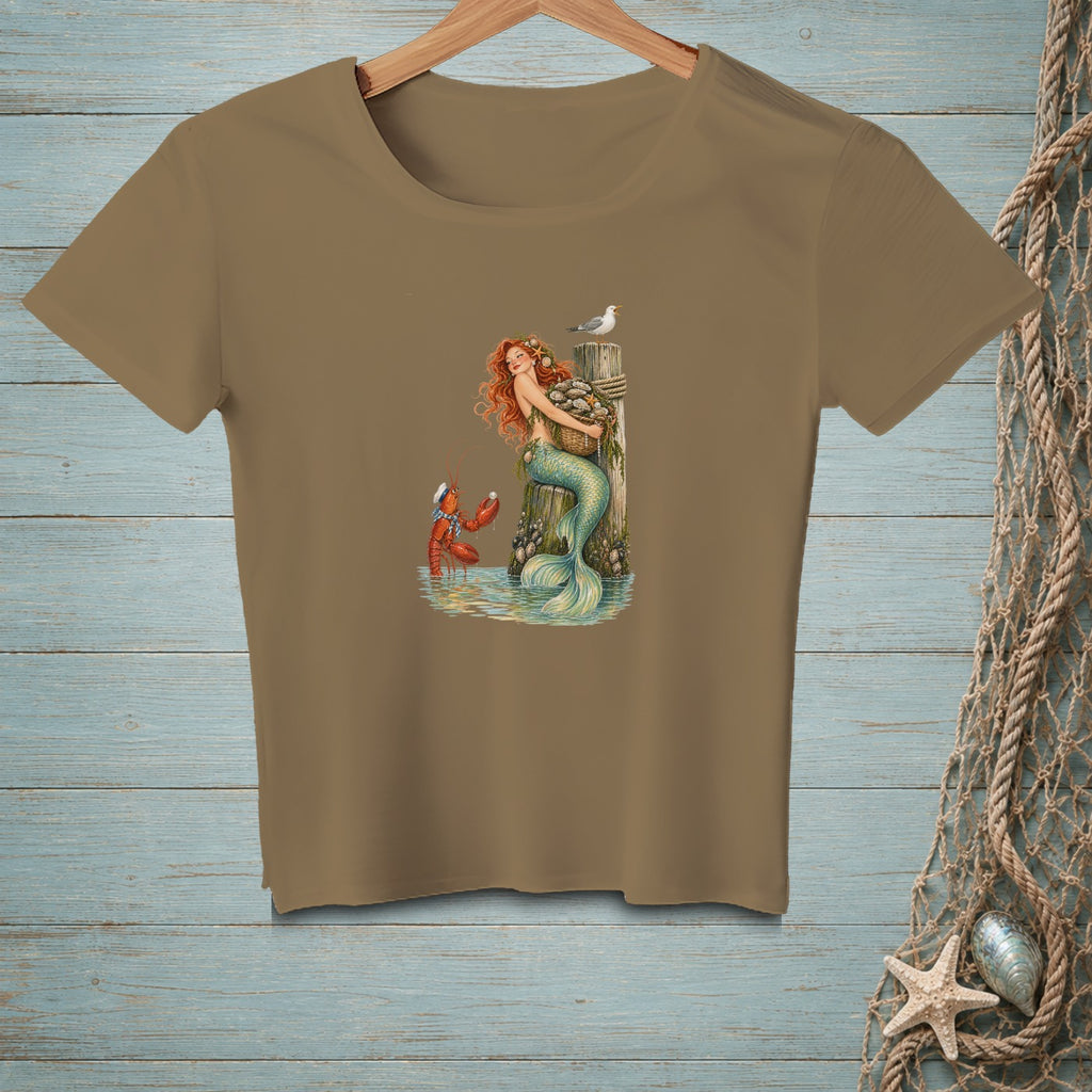 Mermaid with basket, lobster, and seagull on a wooden post with shells.