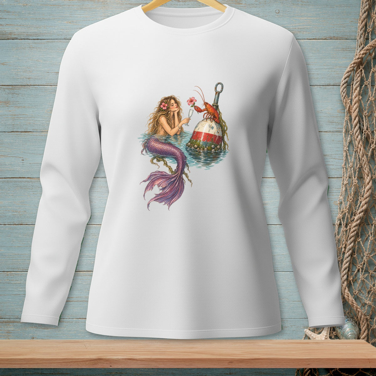 Mermaid and lobster by a buoy in the water on a white long-sleeved shirt.