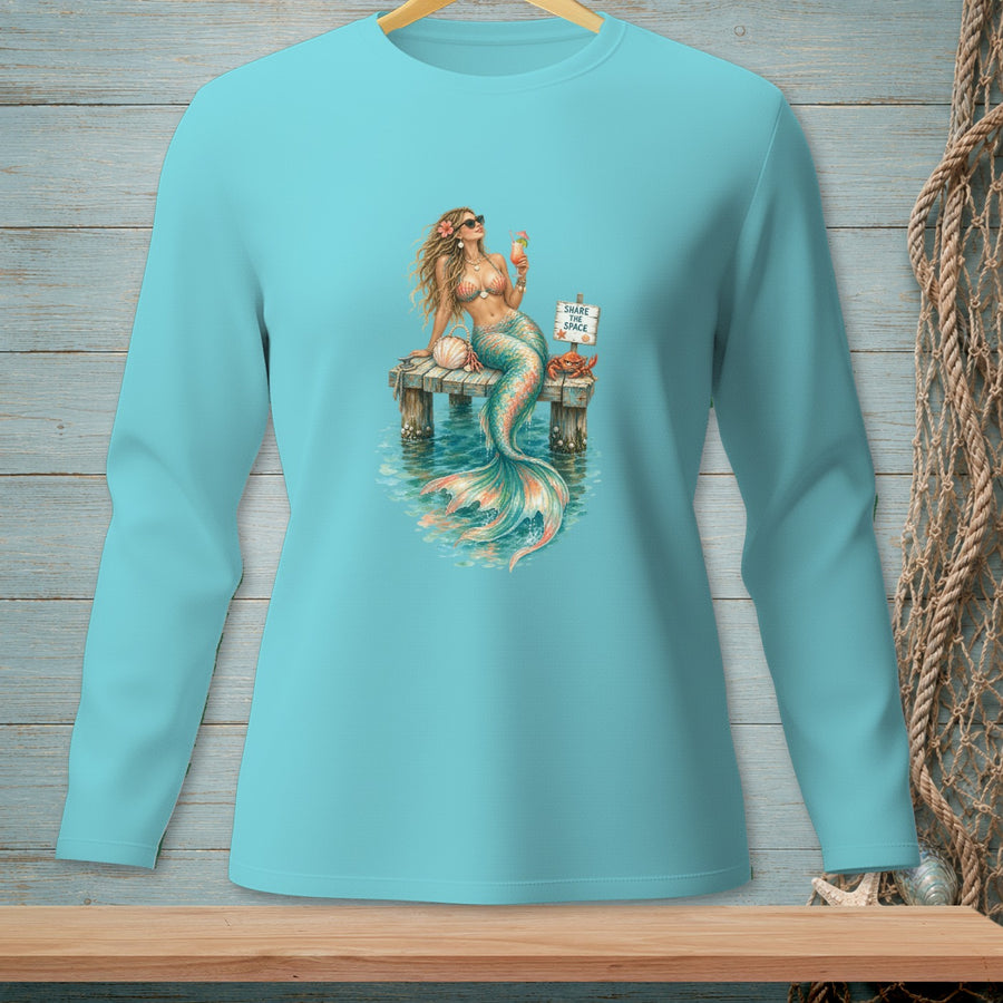 Mermaid with cocktail on dock, text reads "Share the Space".