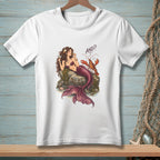 White t-shirt featuring a mermaid on a rock with a lobster and the text "AND?".