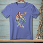 Mermaid holding a pufferfish next to a buoy with "Good Vibes Only" text.