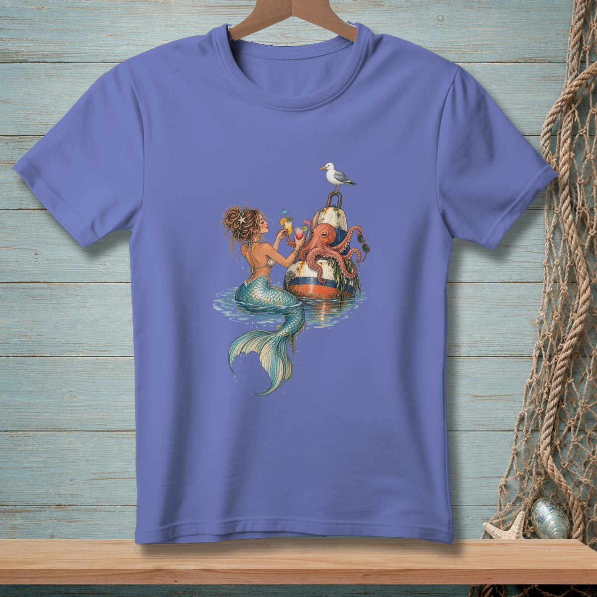 Mermaid and octopus on a buoy with a seagull, holding drinks by the water.