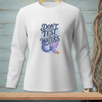 White long-sleeve shirt with "Don't Test the Waters" text, mermaid tail, and crab.