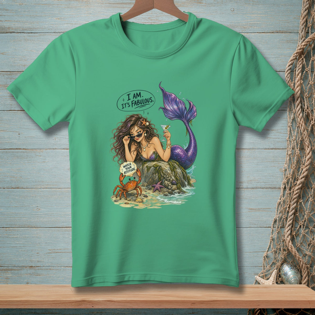 Mermaid with purple tail and sunglasses, holding a drink, with a crab saying "Watch Your Attitude".