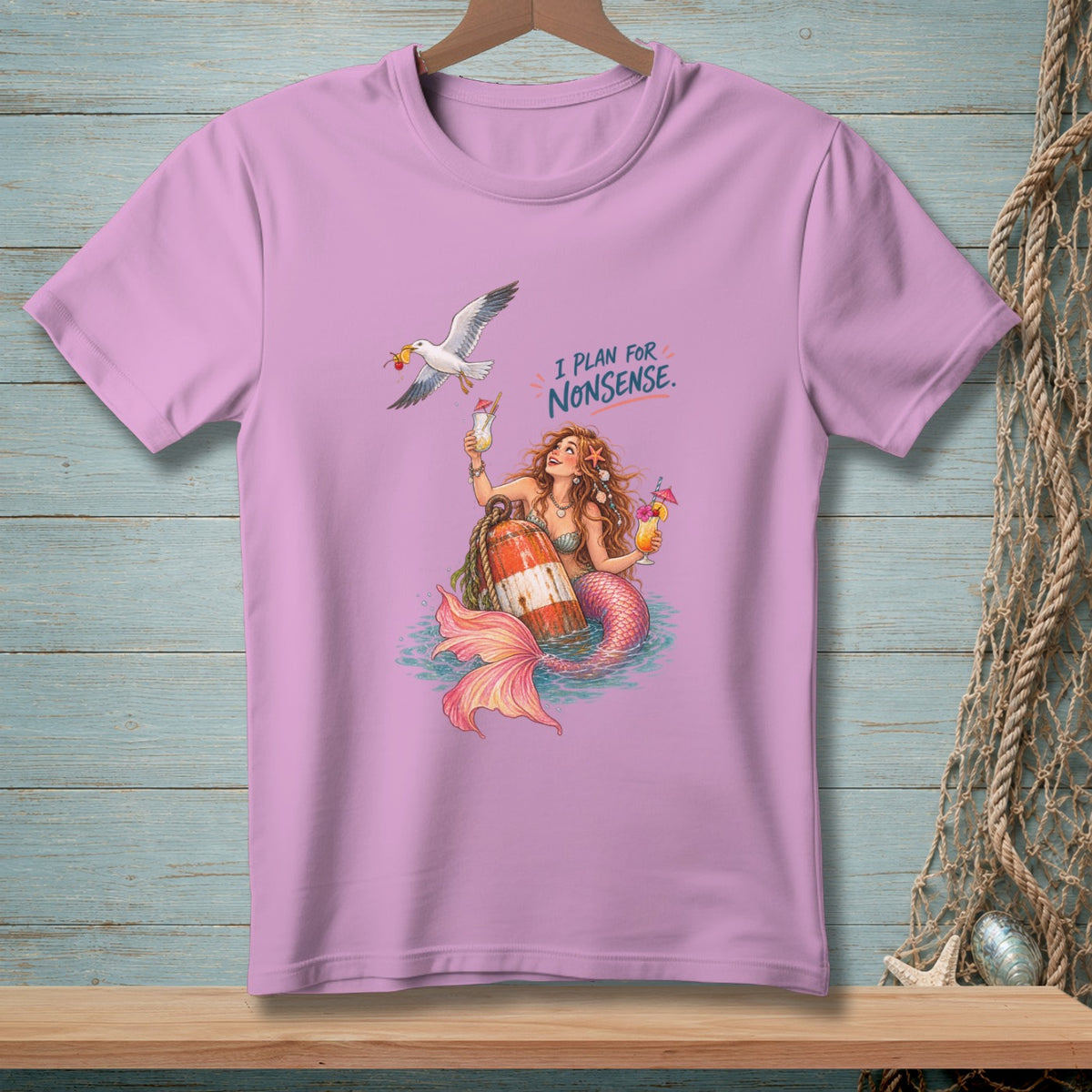 Mermaid with drinks and seagull, with text "I PLAN FOR NONSENSE."