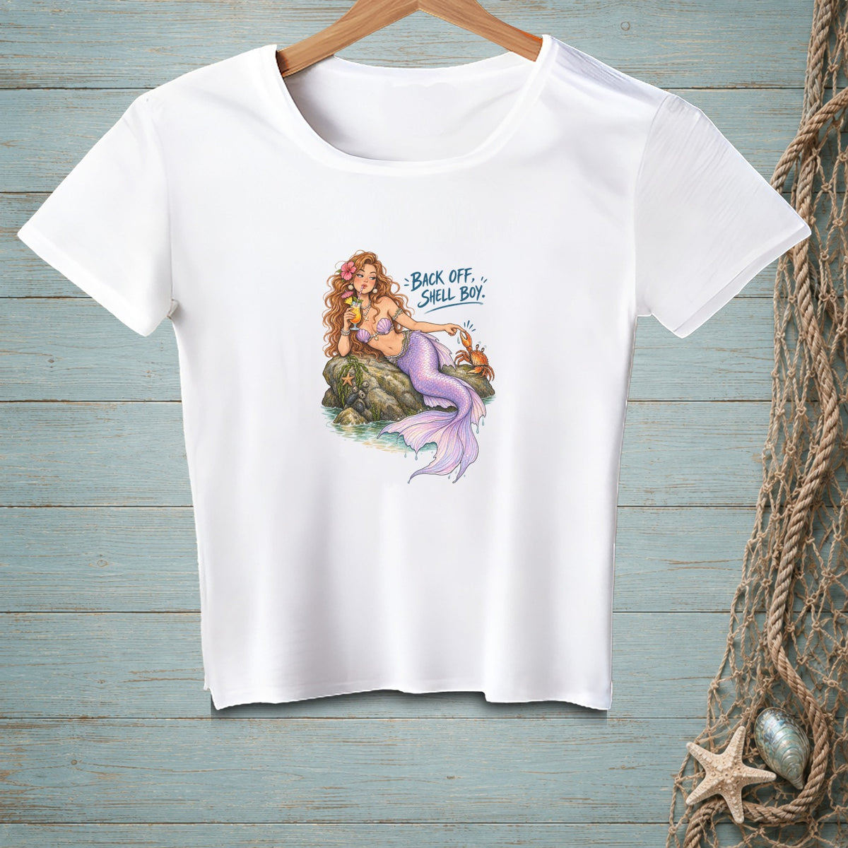 White t-shirt with mermaid illustration and text "BACK OFF, SHELL BOY."