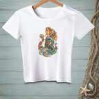 White t-shirt with a print of a mermaid, lobster, and crab by the sea.