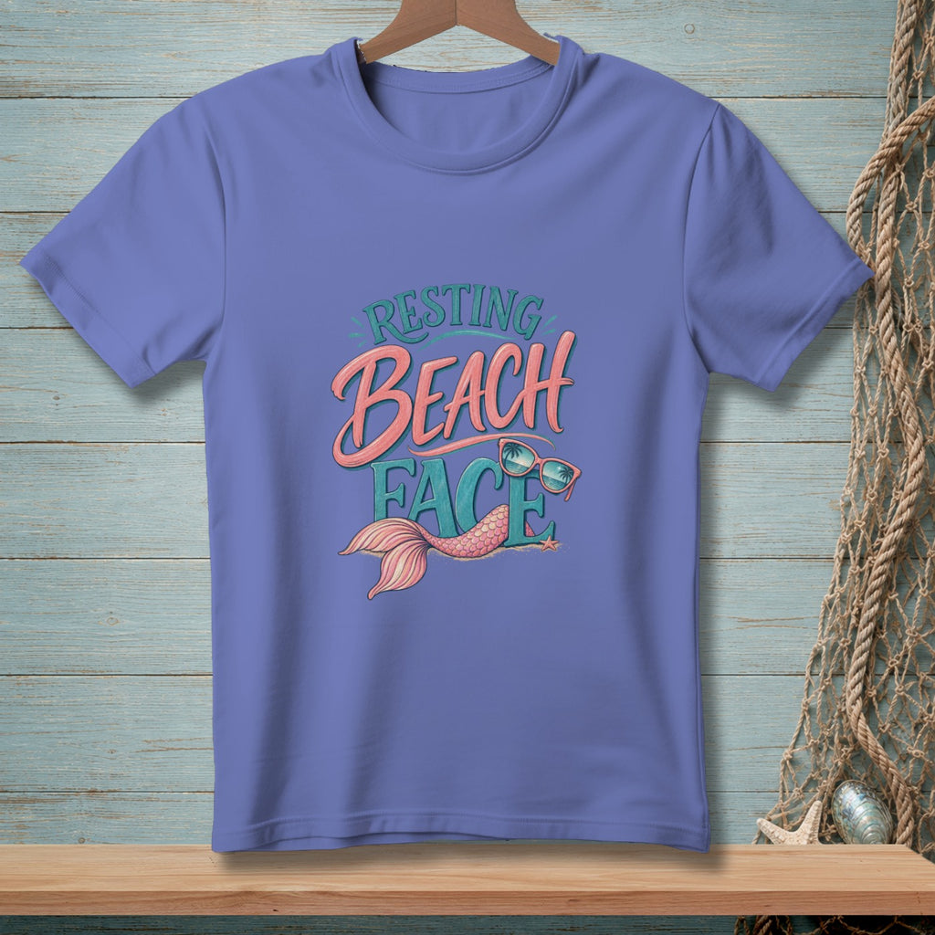 Purple t-shirt with "Resting Beach Face" mermaid graphic and sunglasses.