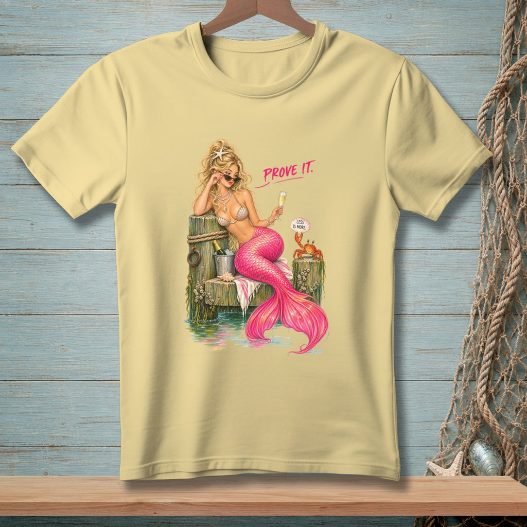 Blonde mermaid with pink tail and sunglasses, holding champagne, with text "PROVE IT.".