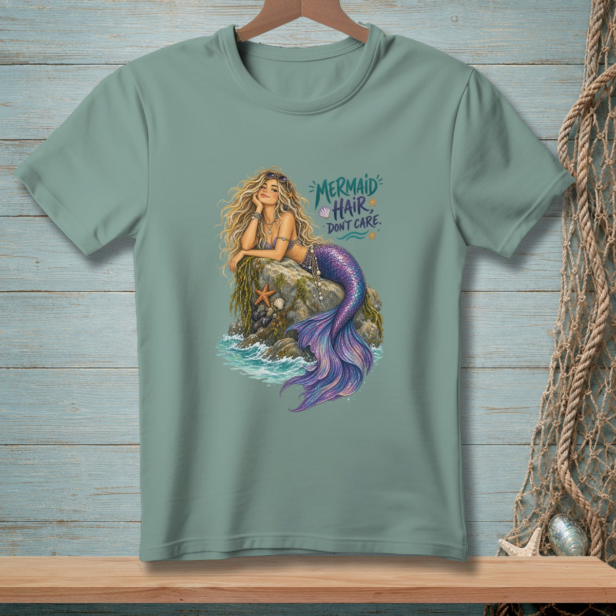 Mint t-shirt with a mermaid graphic and the text "Mermaid Hair Don't Care."