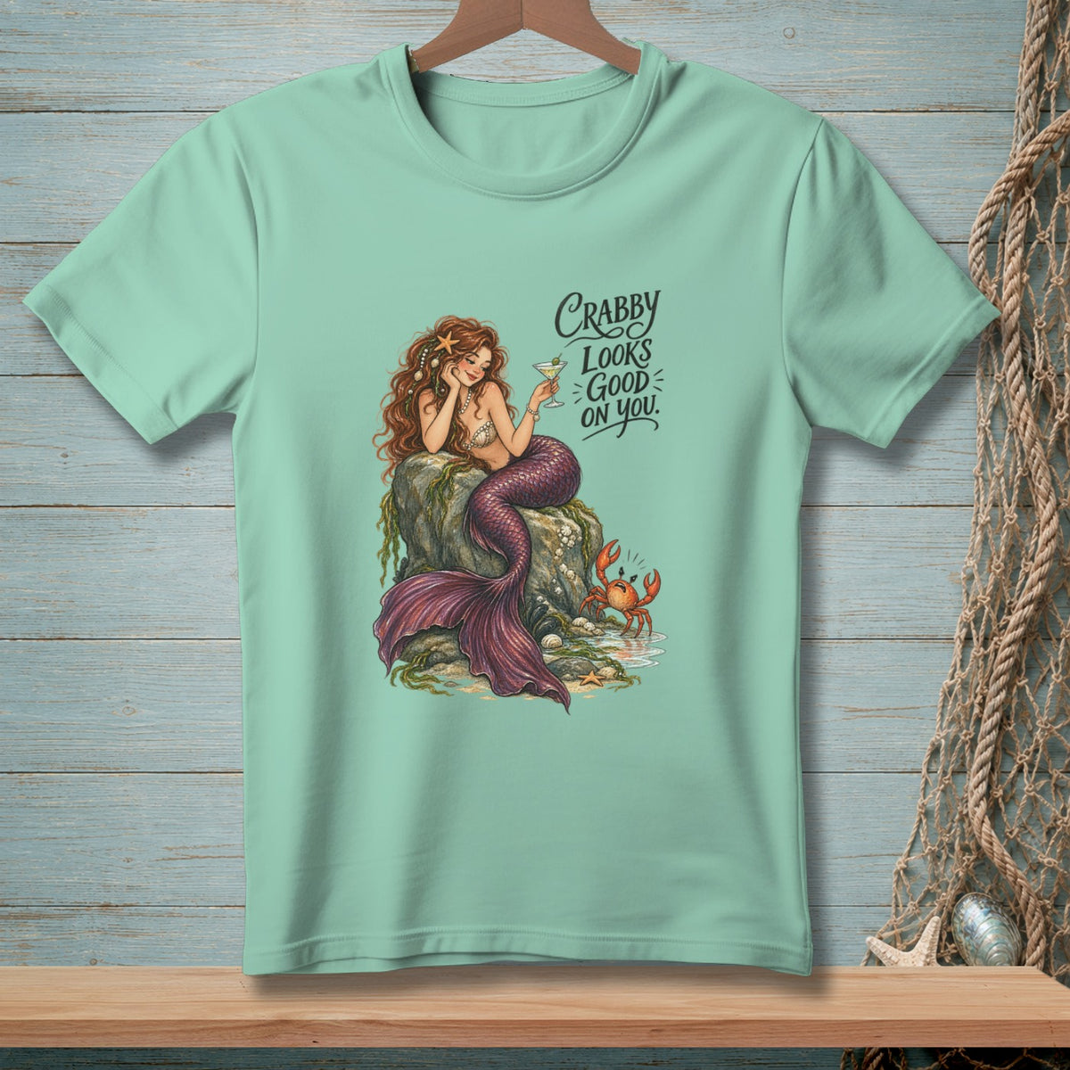 Mint t-shirt with mermaid and crab graphic, "Crabby Looks Good on You."
