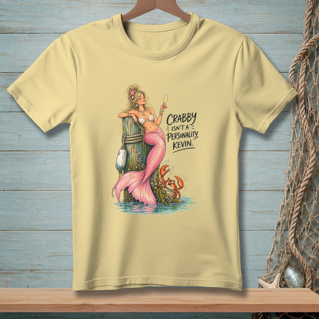 Yellow t-shirt featuring a mermaid and crab with the text "Crabby Isn't A Personality, Kevin."