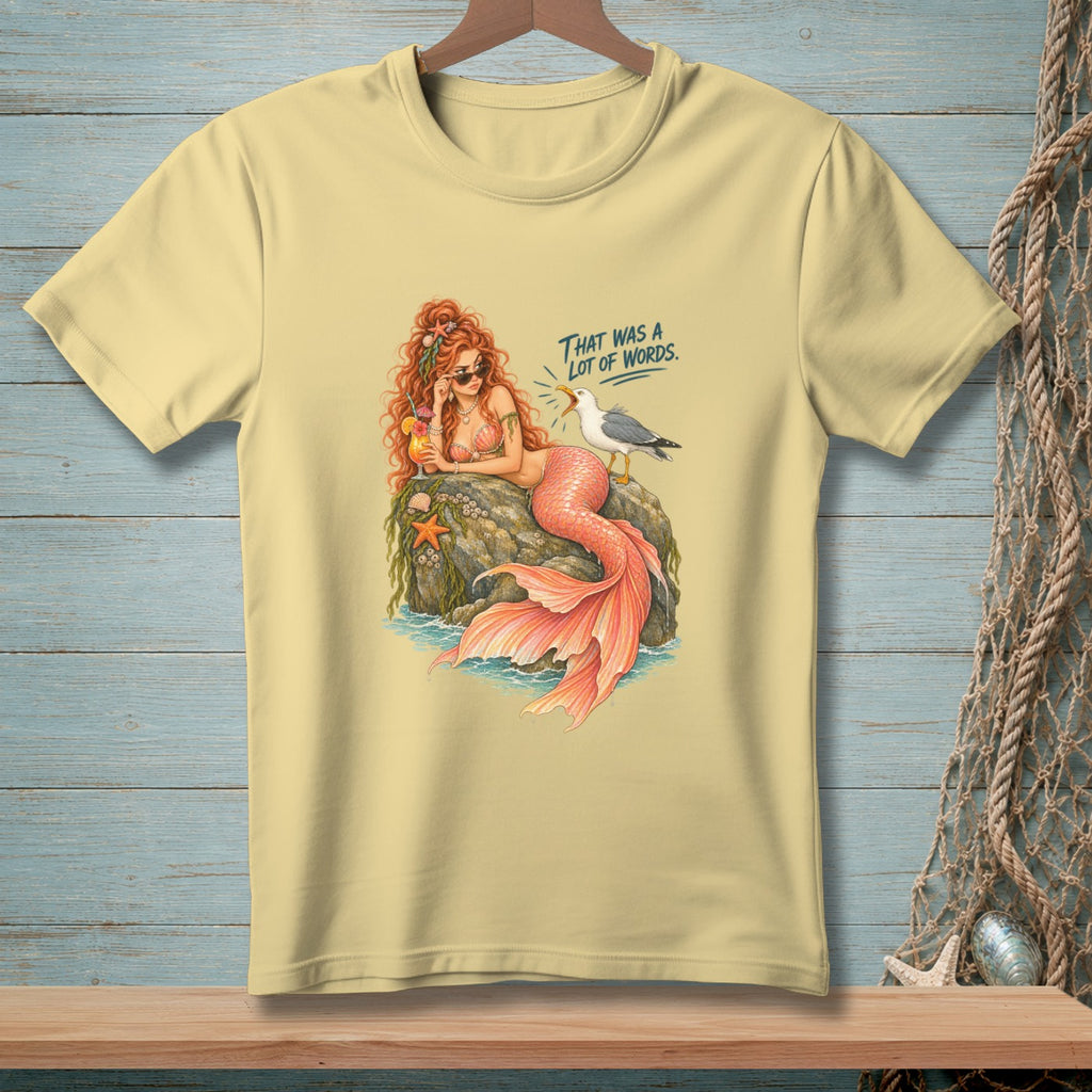 A mermaid with a cocktail and sunglasses is annoyed by a seagull saying "That was a lot of words."