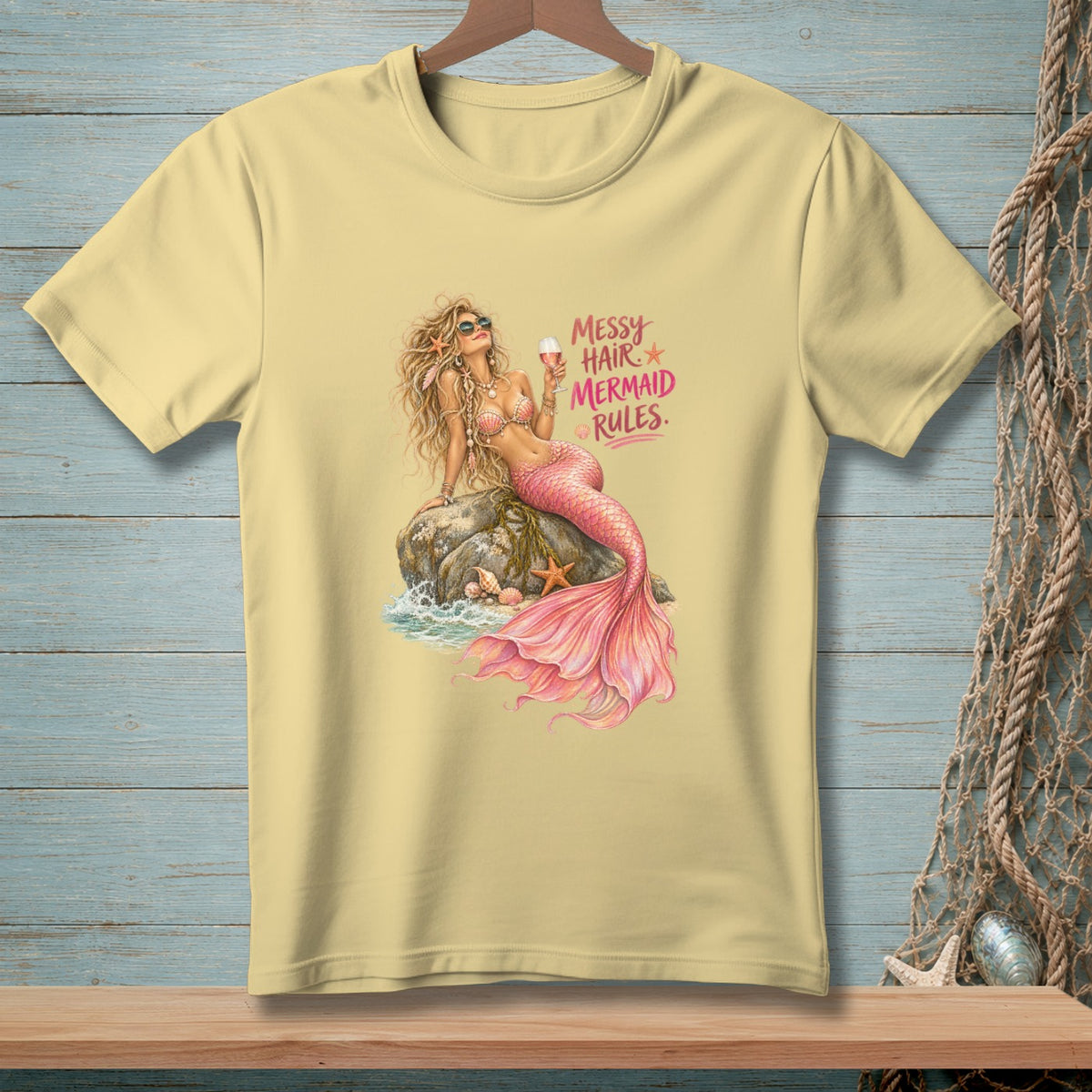 Yellow t-shirt with mermaid graphic and "Messy Hair Mermaid Rules" text.