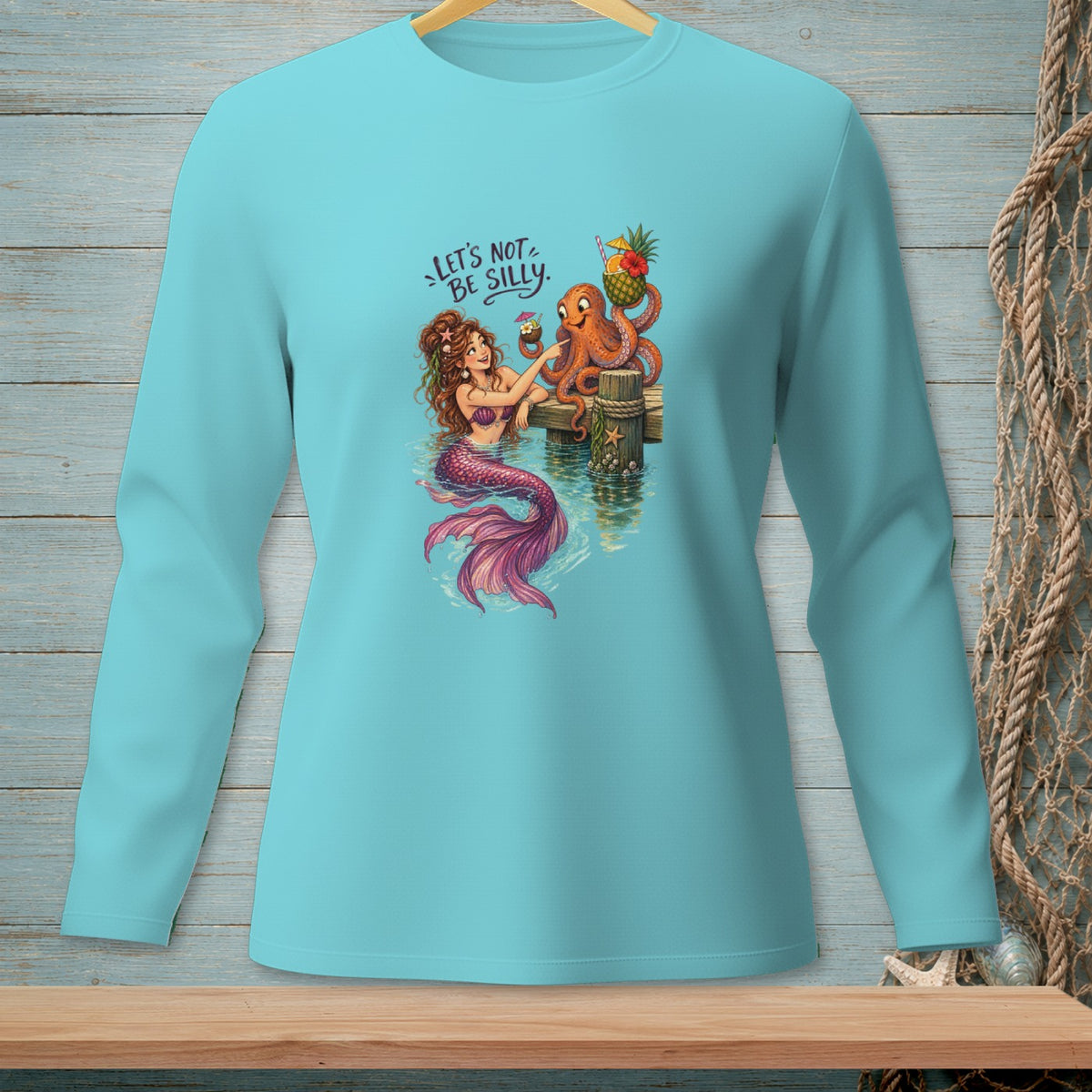 Illustration of a mermaid and octopus on a pier with the text "LET'S NOT BE SILLY."