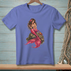Periwinkle t-shirt with a graphic of a mermaid sitting on a rock with a crab.