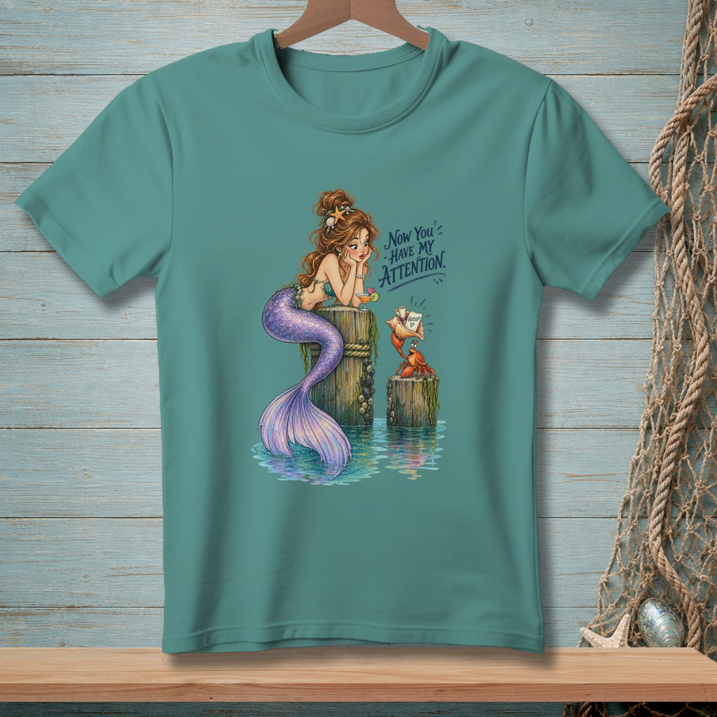 Mermaid and crab on posts with text "Now You Have My Attention."