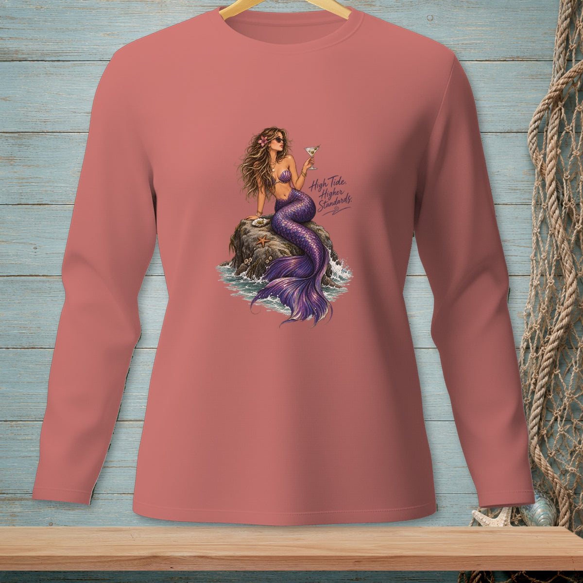 Mermaid on rock with cocktail, text "High Tide, Higher Standards".