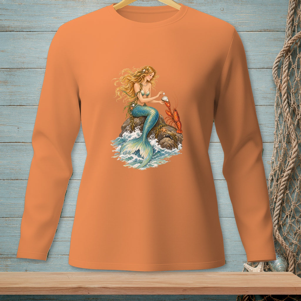 Long-sleeve orange shirt with a mermaid, lobster, and waves graphic.