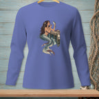 Mermaid applying makeup to a fish on a dock.