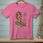 Pink t-shirt with mermaid, octopus, and "The Salt Stays" text.