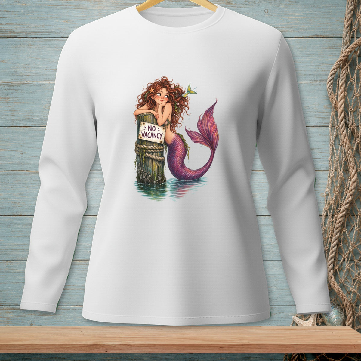Mermaid leaning on a post with "No Vacancy" sign in water.