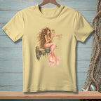 Yellow t-shirt with a watercolor illustration of a mermaid and "Fixed It" text.