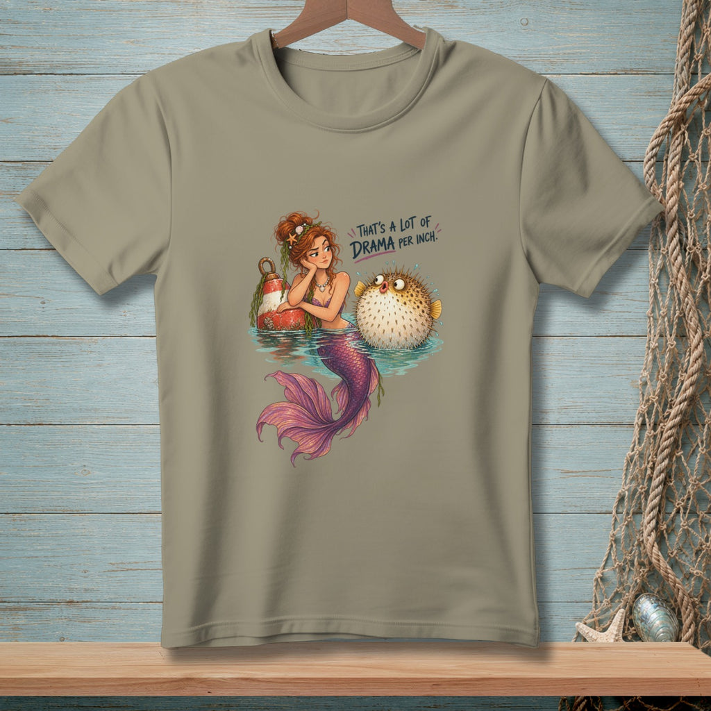 Mermaid and pufferfish with text "That's a lot of drama per inch."