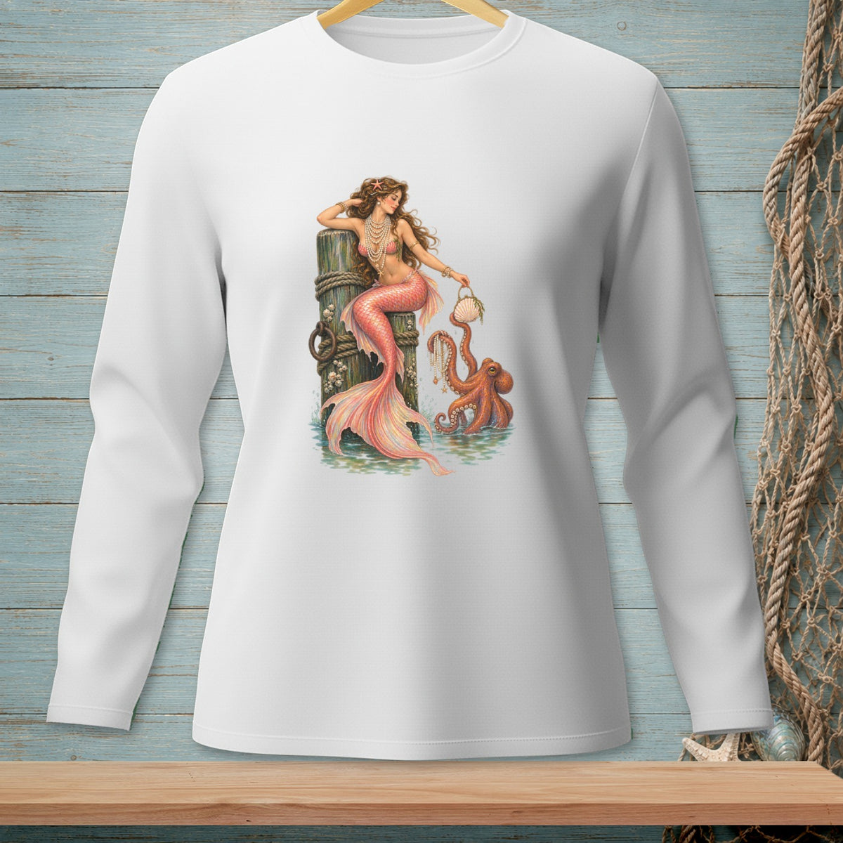 Mermaid with octopus sits on a dock, holding a seashell.