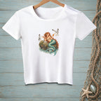 White t-shirt with a mermaid and seagulls on a rock graphic.