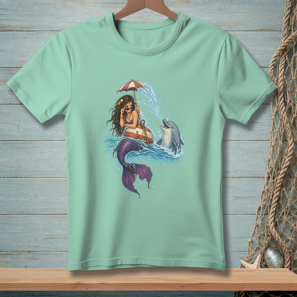 Mermaid with umbrella and dolphin playing in the ocean waves.