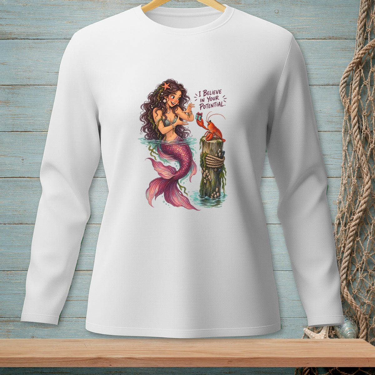 Mermaid with lobster on a post, text reads "I BELIEVE IN YOUR POTENTIAL."