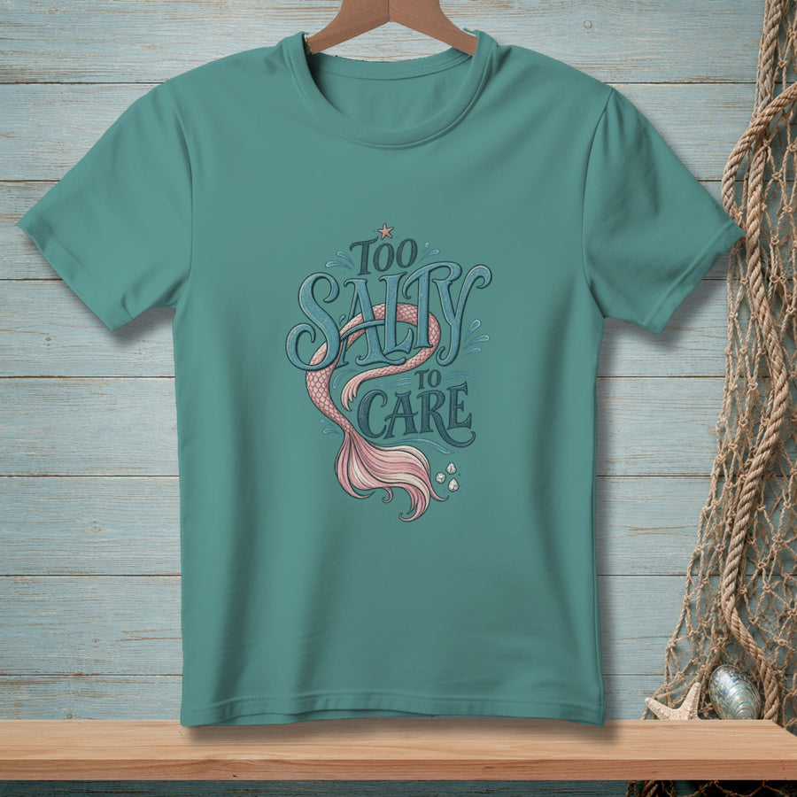 Teal t-shirt with "Too Salty To Care" text and mermaid tail graphic.