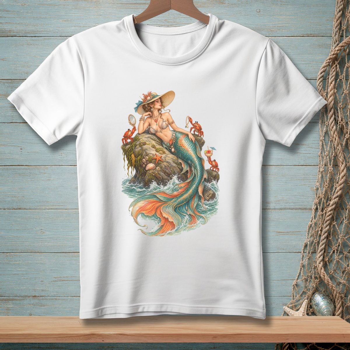 White t-shirt with a detailed mermaid illustration and surrounding sea creatures.