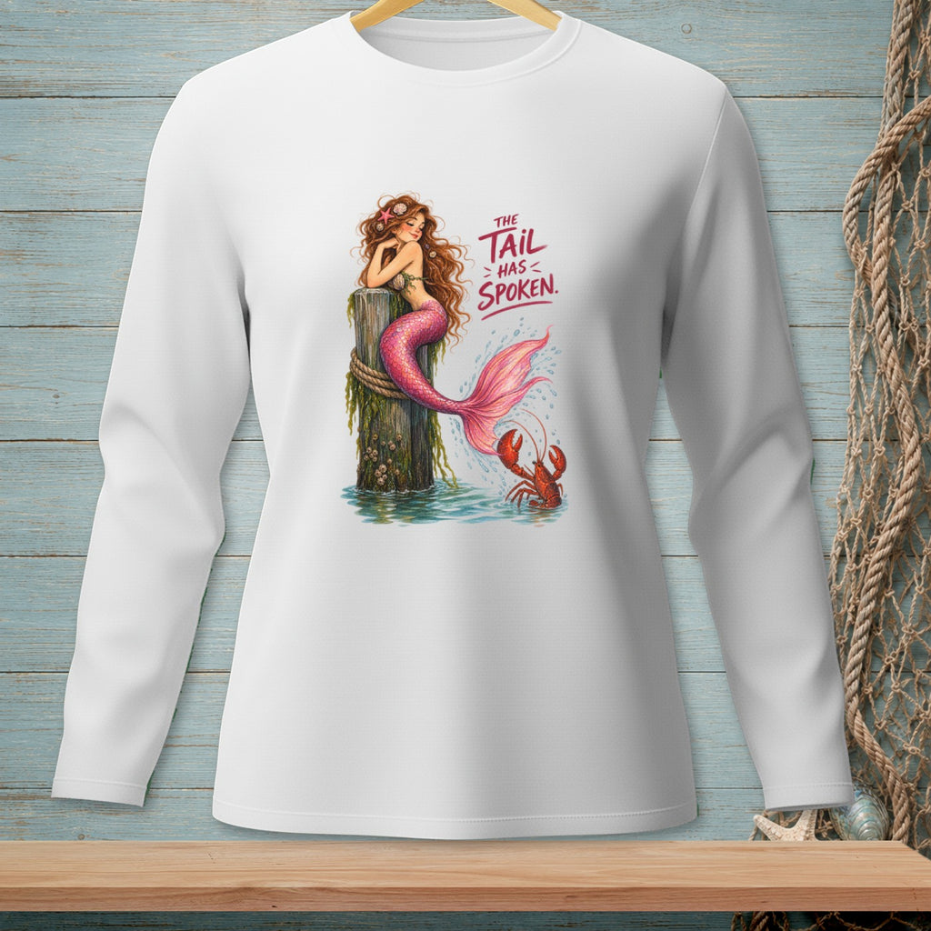 Mermaid with pink tail on pier, lobster, text "The Tail Has Spoken".